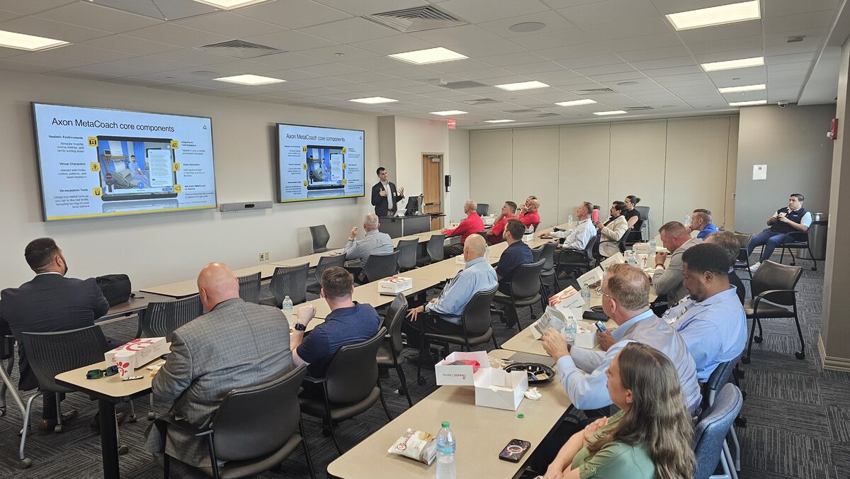 Chapter members listening during the Axon MetaCoach session